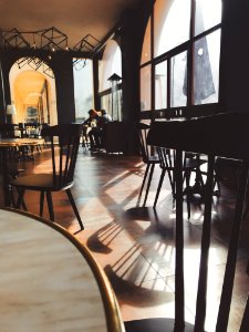 Photo Of Black Wooden Dining Chair On Restaurant photo