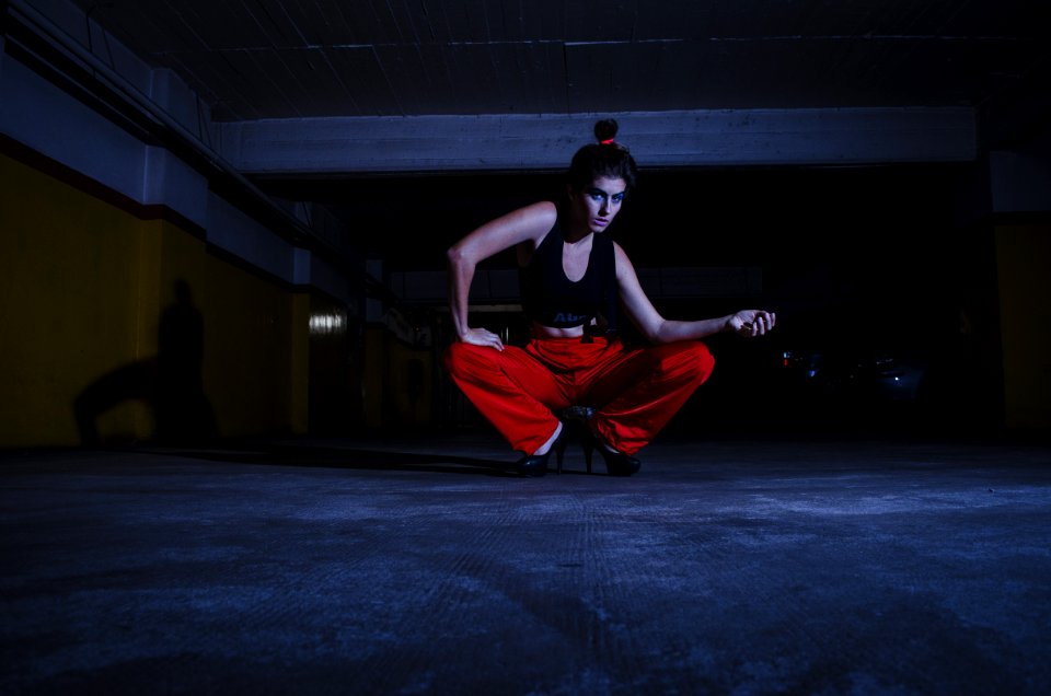 Photo Of Woman Wearing Sports Bra And Red Pants