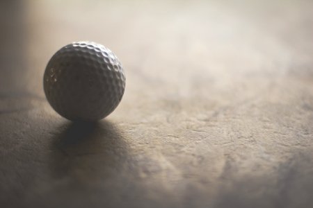 Close-Up Photography Of Golf Ball photo