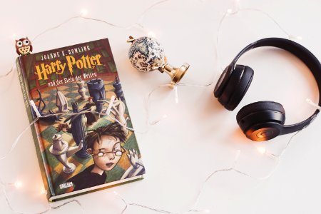 Harry Potter Book And Black Headphones With Trinket photo