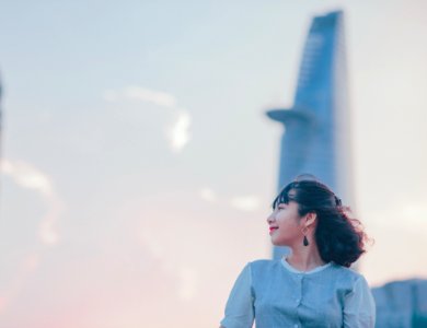 Photo Of Woman Wearing Gray Button-up Top photo