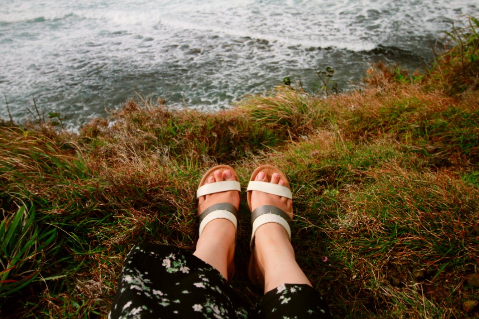 Photography Of A Person Wearing Sandals