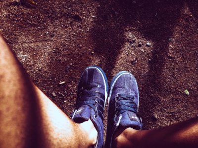 Photo Of Pair Of Blue Sneakers photo