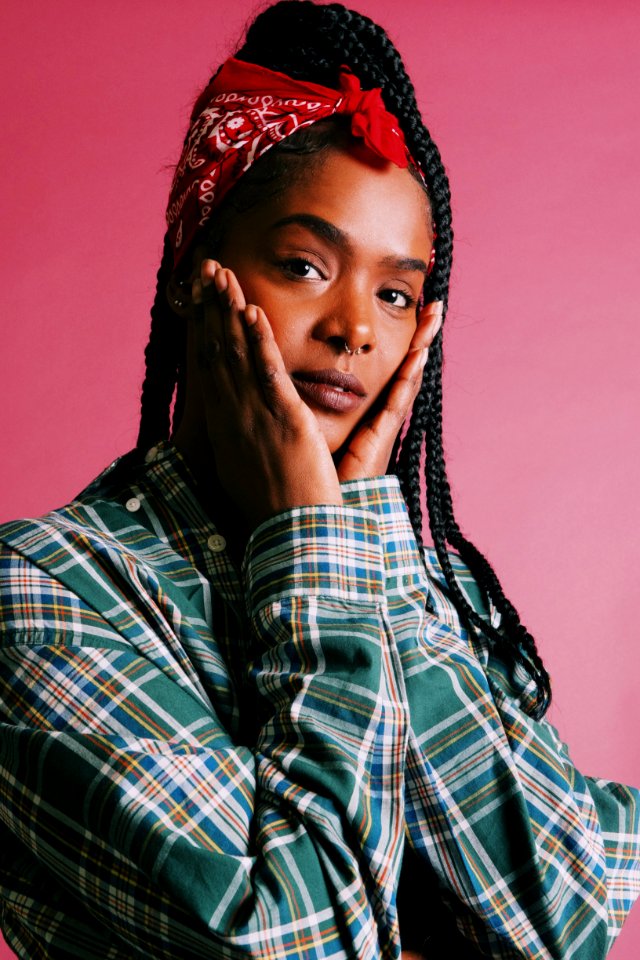 Close-Up Photography Of A Woman Wearing Red Bandana
