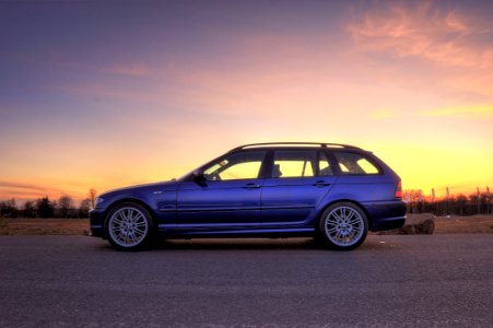 Side View Photography Of Car During Dawn photo