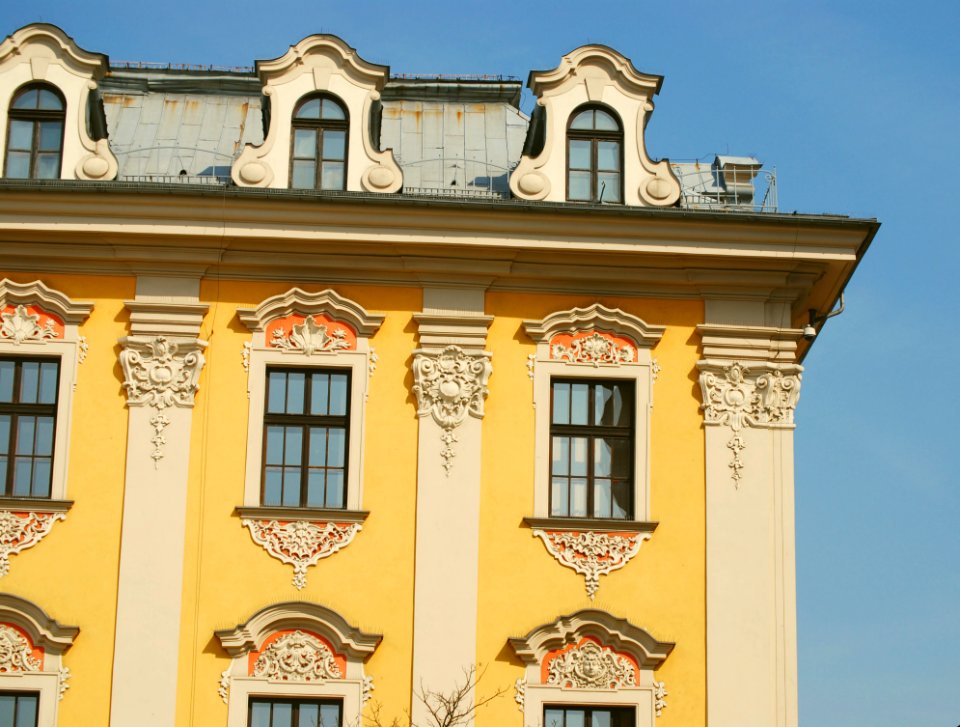 White And Yellow Painted Concrete Building