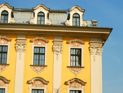 White And Yellow Painted Concrete Building photo