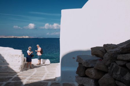 Two People Next To Ocean photo