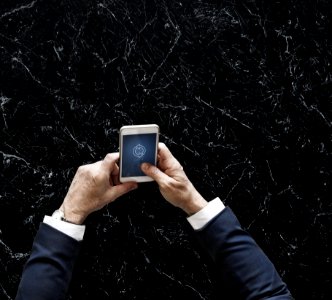 Person Holding White Android Smartphone