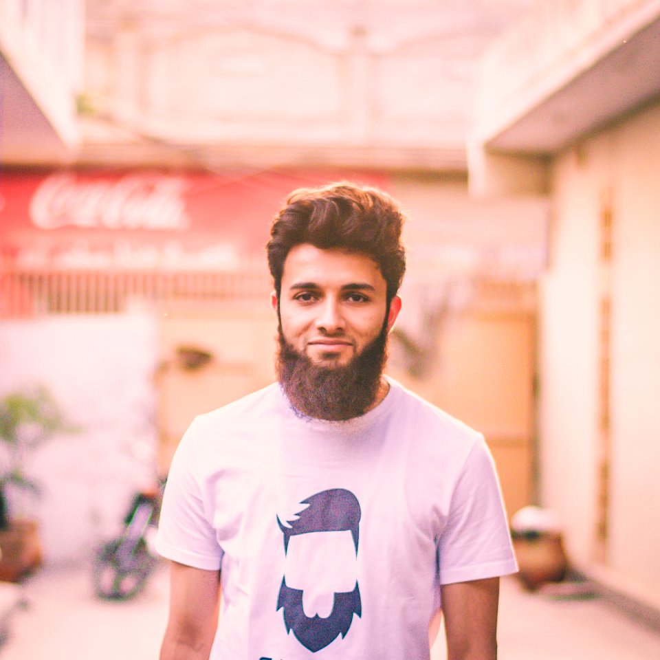 Man Wearing White Crew-neck T-shirt photo