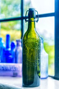 Empty Green Glass Bottle