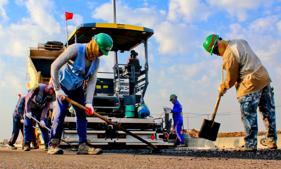 Construction Workers On Road
