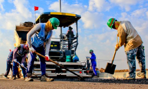 Construction Workers On Road