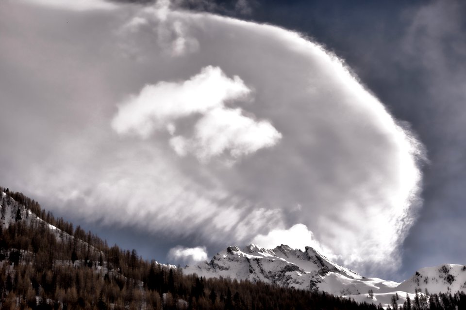 Photography Of Mountain Under Cloudy Sky