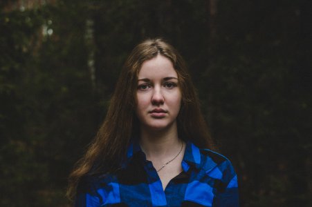 Woman In Blue And Black Plaid Button-up Shirt photo