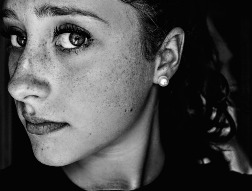 Grayscale Photo Of A Woman
