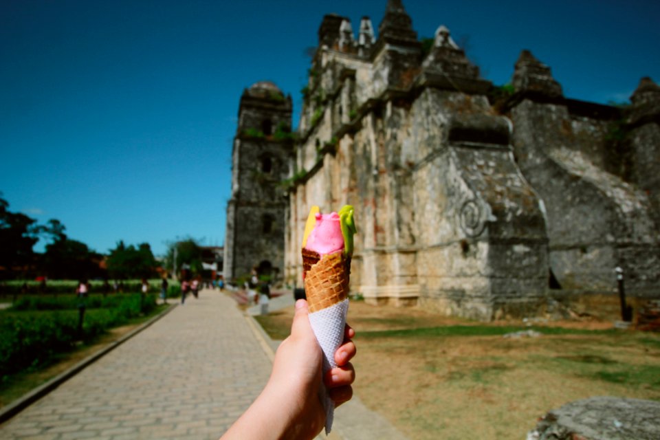 Person Holding Ice Cream With Cone photo