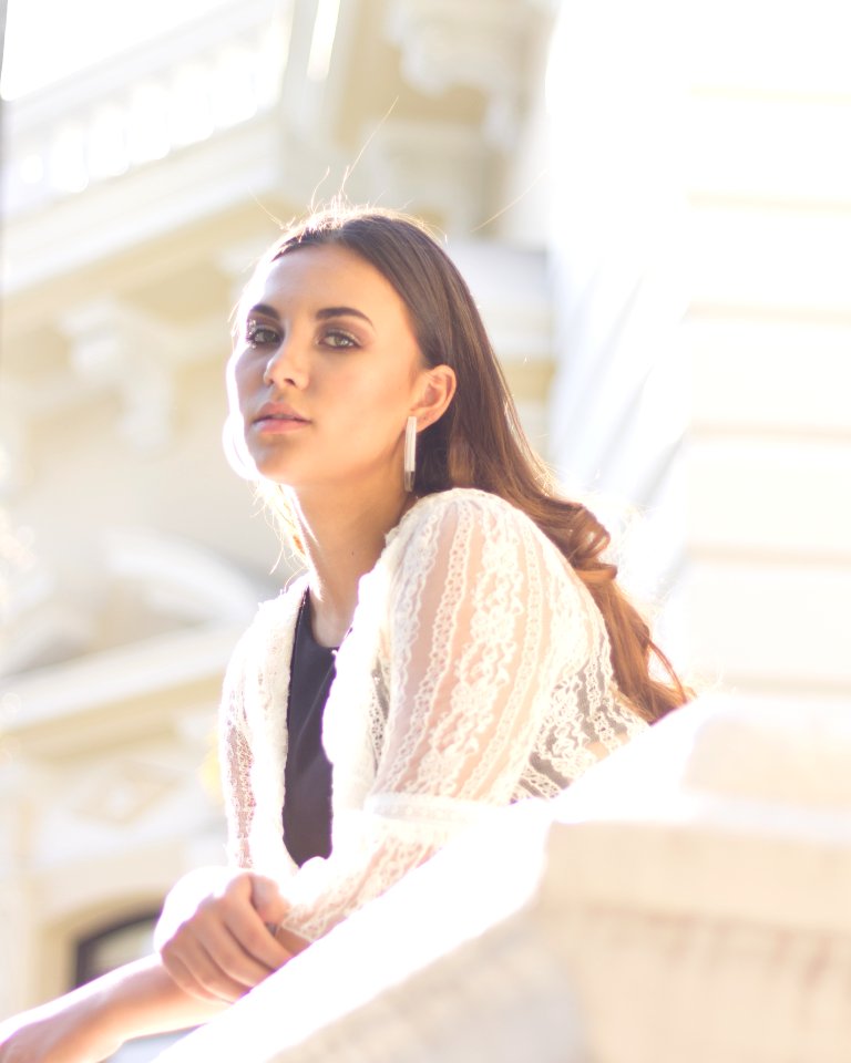Woman Wearing White Lace Top