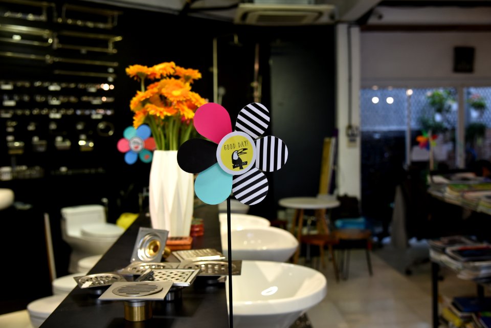Assorted-color Flower Decoration Beside Stainless Steel Sink Holes
