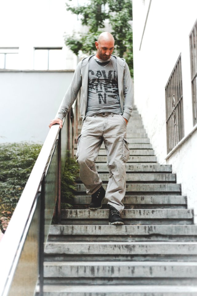 Man Walking Down The Stairs