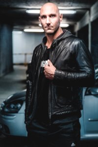Man Wearing Black Leather Zip-up Jacket photo