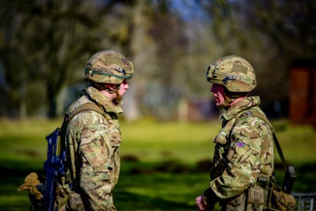 Selective Focus Photography Of Two Soldiers