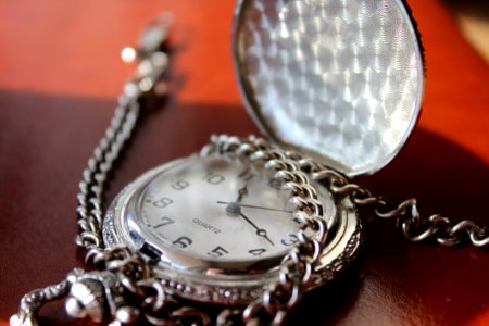 Round Silver-colored Pocket Watch photo