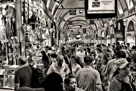 Grayscale Photo Of People At Market photo