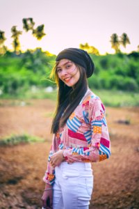 Photo Of Woman Wearing Colorful Top photo