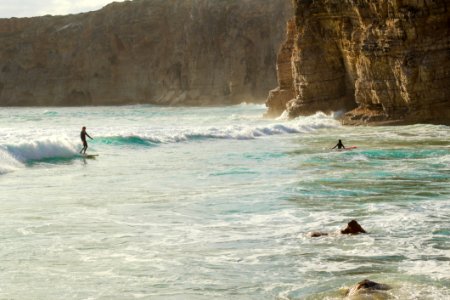 Photo Of People Surfing photo