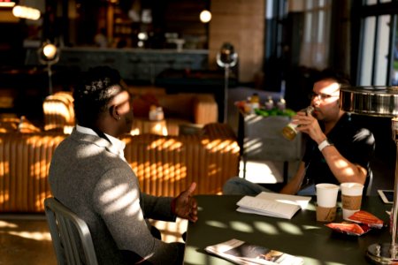 Two Men In A Conversation photo