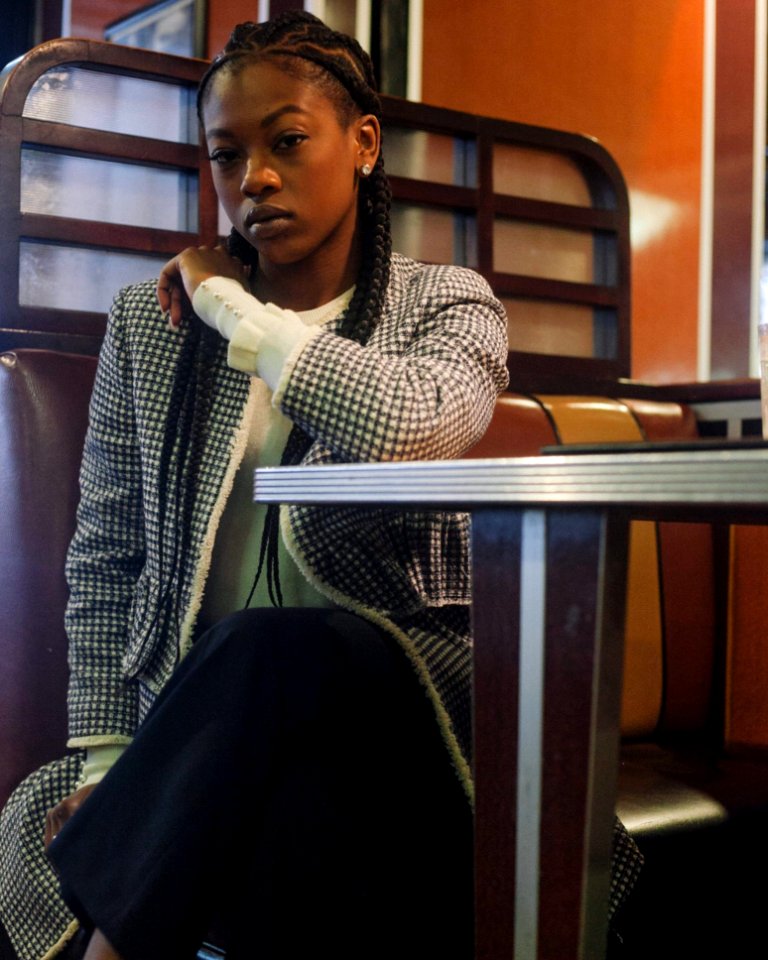 Woman Wearing Black And White Cardigan