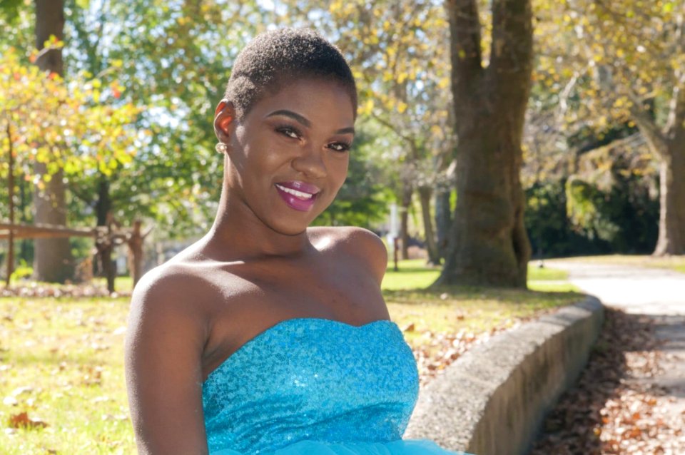 Woman Wearing Blue Strapless Top