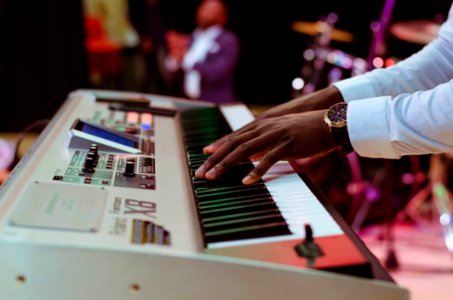 Photo Of A Person Playing Electronic Keyboard photo