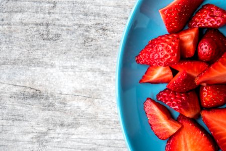 Bowl Of Slices Of Strawberries