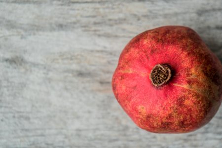 Close Up Photograph Of Round Red Fruit photo