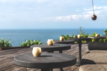 Tilt Lens Photography Of Black Wooden Table