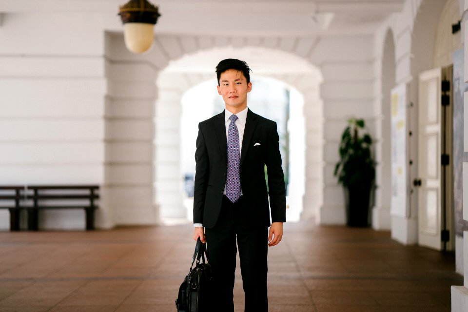 Men Wearing Black Suit Jacket And Pants