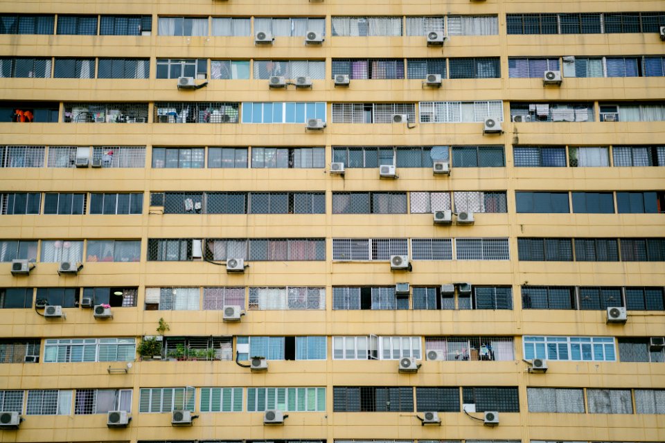 Grey And Brown Building With Air Condensers