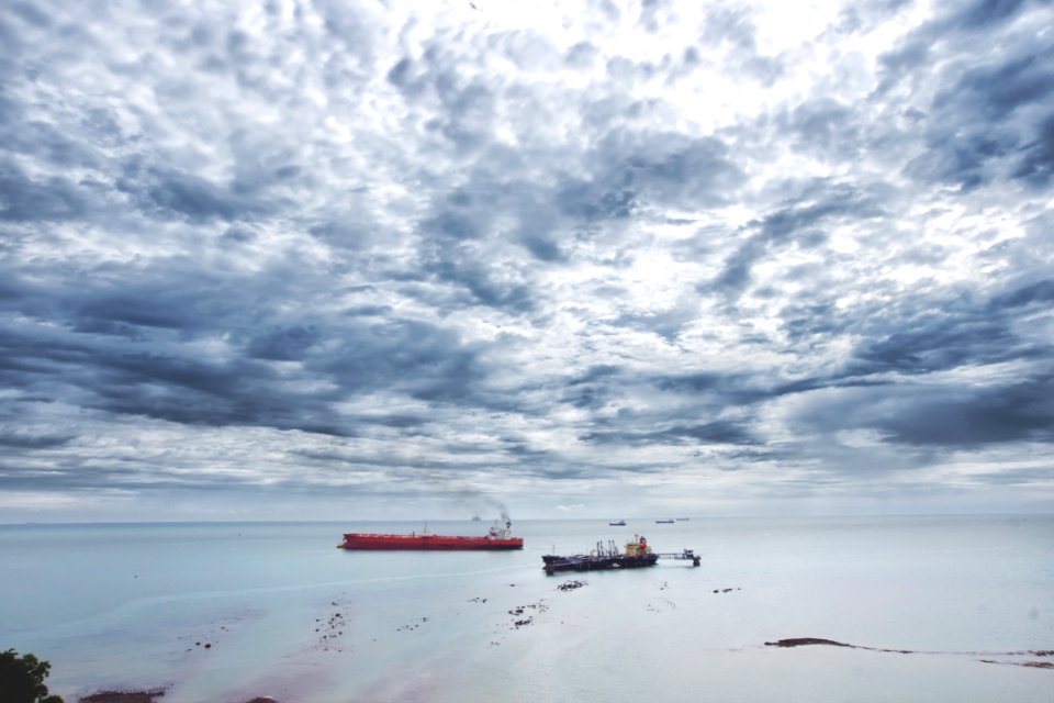 Photo Of Boats On Seashore
