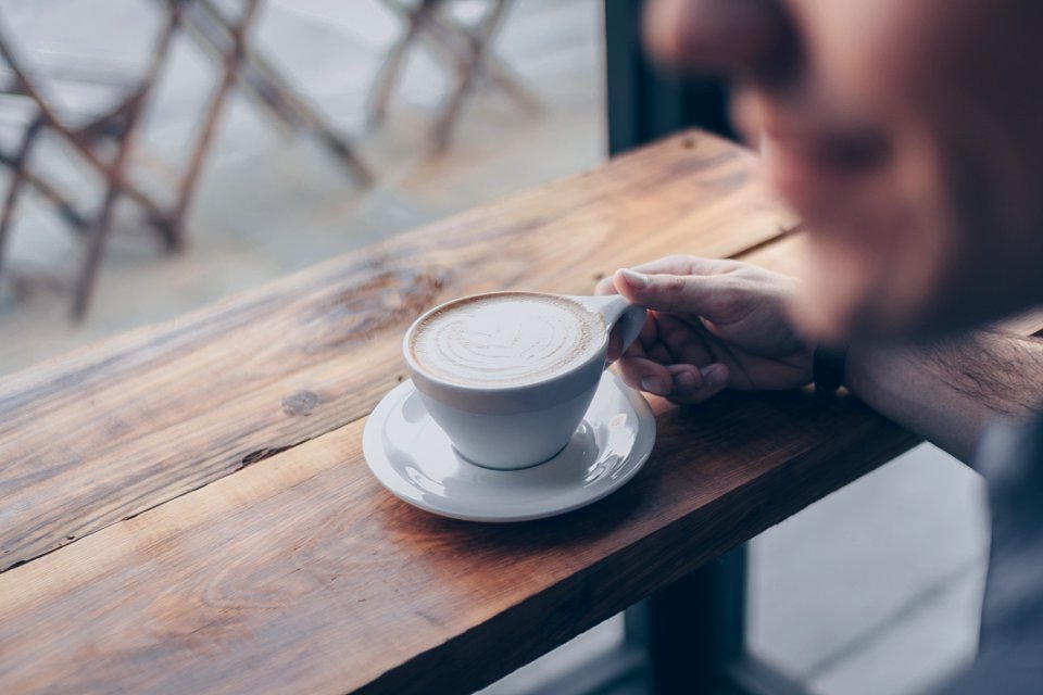 Person Holding White Mug Filled With Coffee