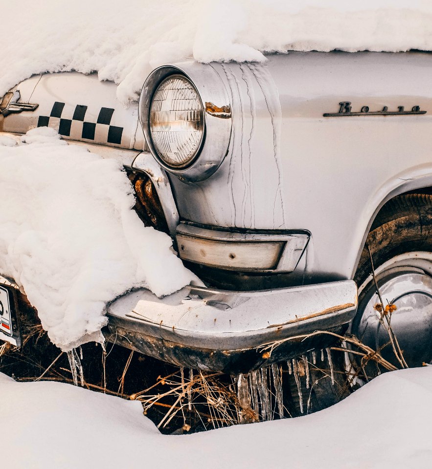 Close-Up Photography Of Vintage Car Covered With Snow
