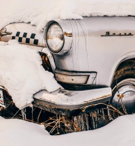 Close-Up Photography Of Vintage Car Covered With Snow