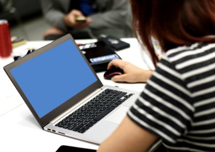 Selective Focus Photography Of A Woman Using Laptop photo