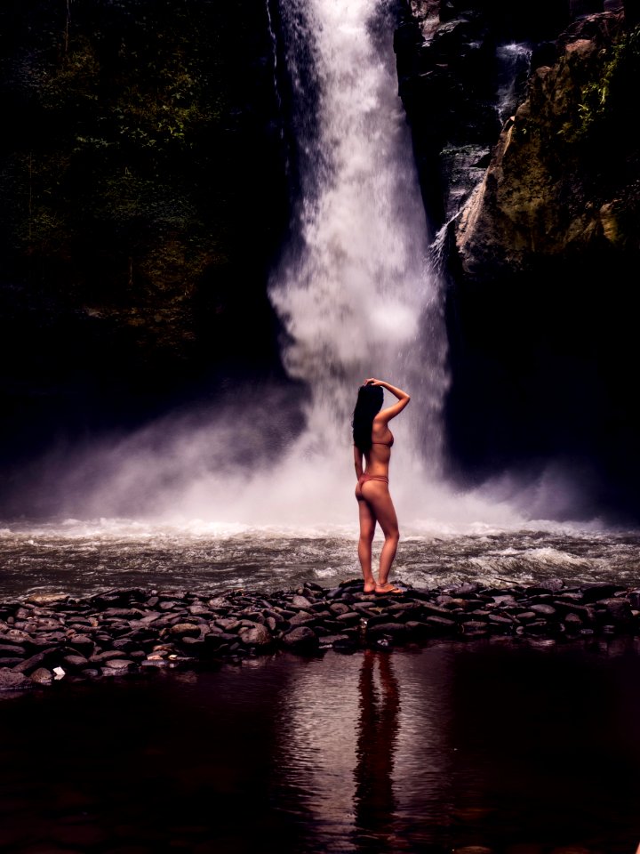 Photo Of A Woman Wearing Bikini In Front Of Waterfalls