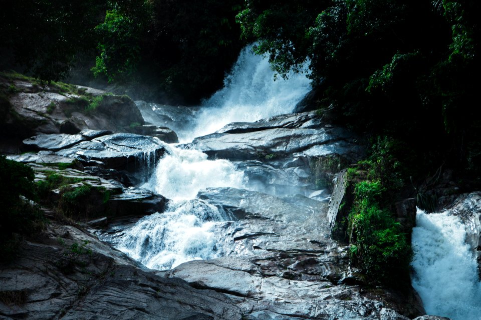 Photography Of Waterfalls Near Trees photo