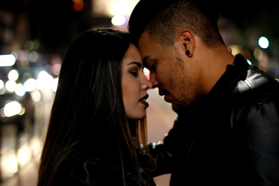 Man And Woman About To Kiss Each Other