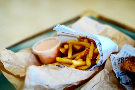 French Fries On White Paper photo