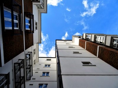 Worms Eyeview Photography Of White And Brown Buildings photo