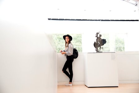 Woman Standing At The Corner
